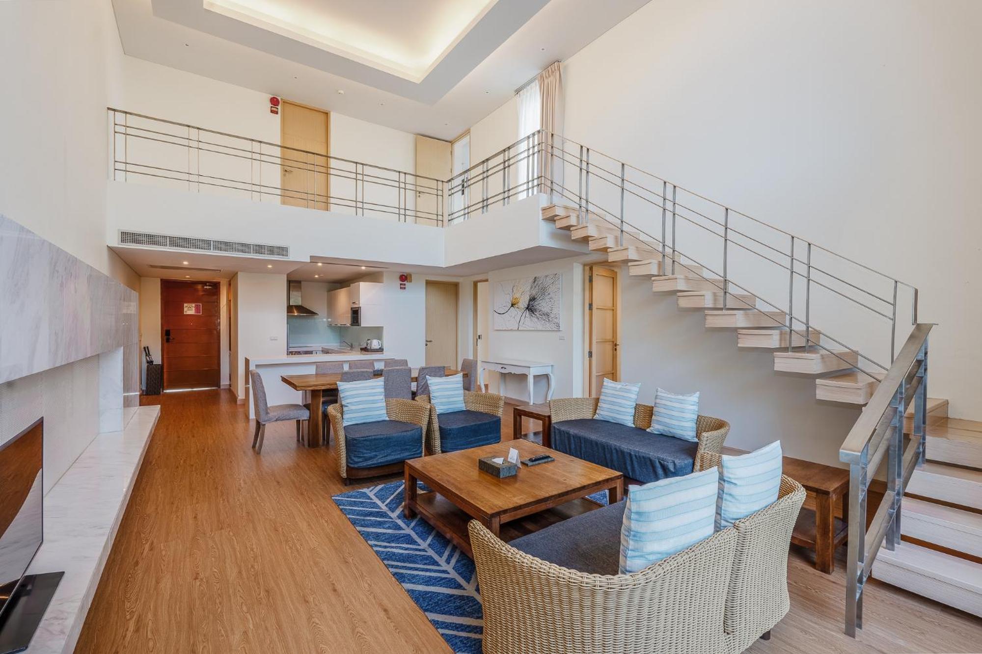 Splash Beach Resort, Maikhao Phuket - Sha Extra Plus Παραλία Μάι Κάο Εξωτερικό φωτογραφία A living room in a duplex suite at the Park Hyatt Maldives